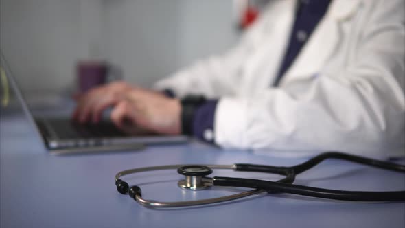 Close Up Shot of a Stethoscope, Which Lies Next To a Doctor in a Private Clinic.