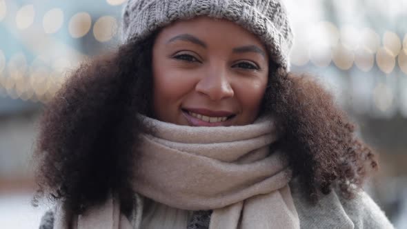 Pretty African American Woman is Posing and Smiling for Camera While Standing in Outdoors Spbi