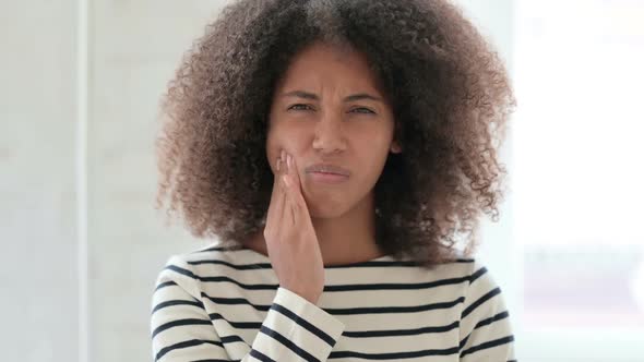 Sad African Woman Having Toothache