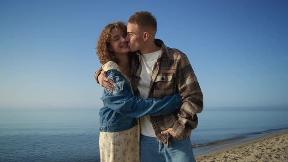 Cheerful Couple Dating on Beautiful Sea Coast