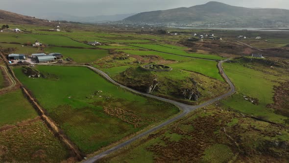 Leacanabuaile Ringfort, Kerry, Ireland, March 2022. Drone orbits the ancient stone monument counterc