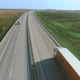 Trucks and Cars Drive Along the Highway - VideoHive Item for Sale