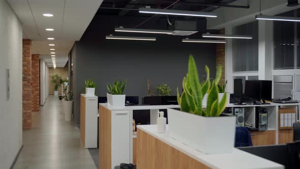 Empty office with pc and monitors 4K. Shot with movement