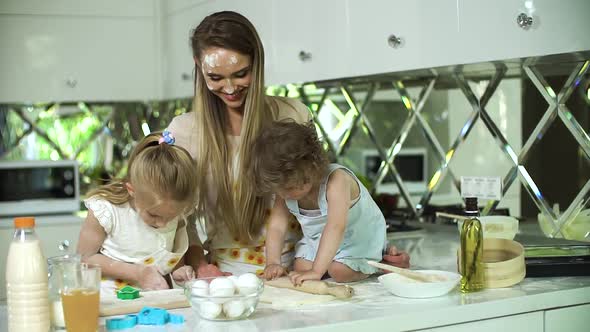 Happy Family Cooking Together At Modern Kitchen