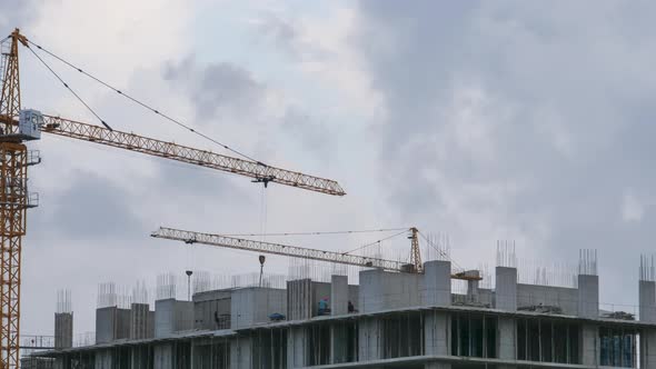 Building Construction. Tower Crane on a Construction Site, Builders Work, Timelapse