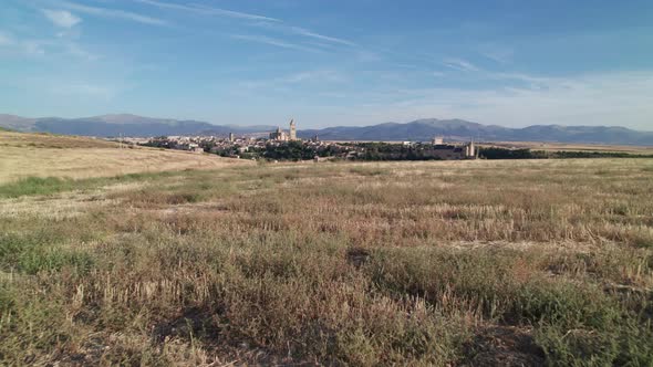 Historic cultural city Segovia, Spain at the distance. Segovia Cathedral and Alcazar Castle