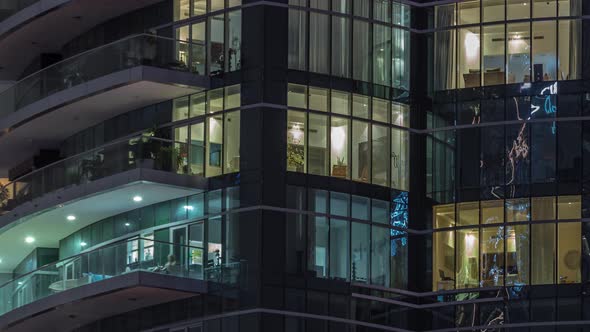 Flat Night Panorama of Multicolor Light in Windows of Multistory Buildings Aerial Timelapse