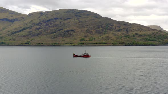 A Commercial Vessel Traversing A Sea Lake From The Air