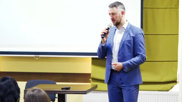 young businessman at business conference room with public giving presentations.