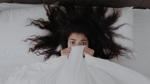 Scared Funny African American Girl Lying in Bed Covering Face with Blanket Frightened Woman Covering