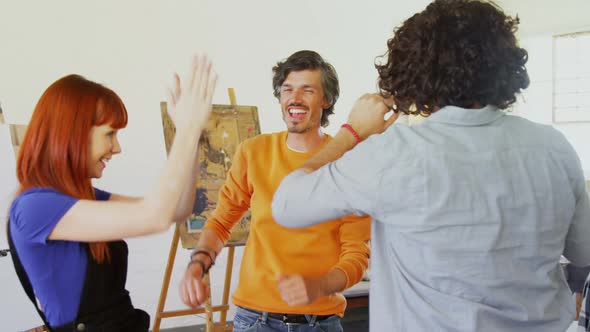 Artists giving high five to each other 4k