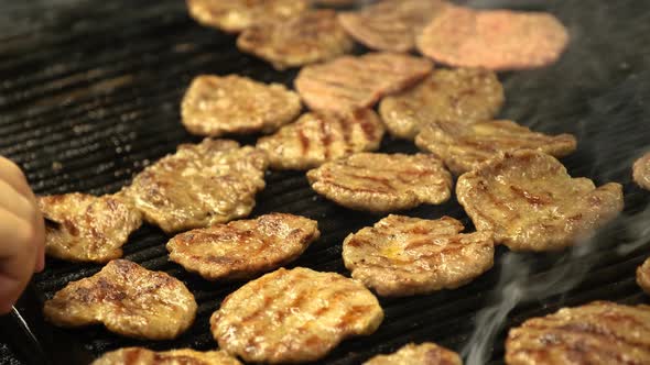 Cooking Cow Meatball Food on a Barbecue Wood Fire