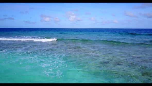 Aerial top down sky of relaxing tourist beach break by blue water and clean sandy background of a da