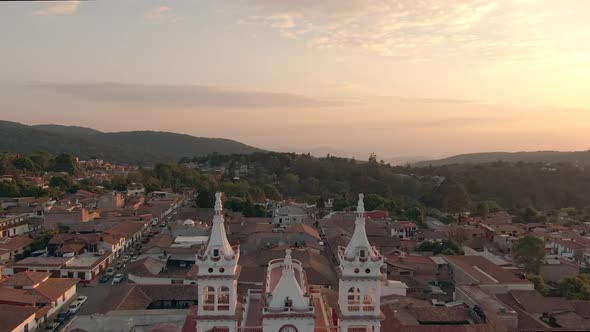 Fly Over San Cristobal Church Steeple During Sunset In Mazamitla, Jalisco, Mexico. - Aerial Drone Sh