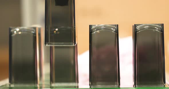 Close Up Of Molded Plastic Products Being Released By An Automatic Machinery In An Injection Molding