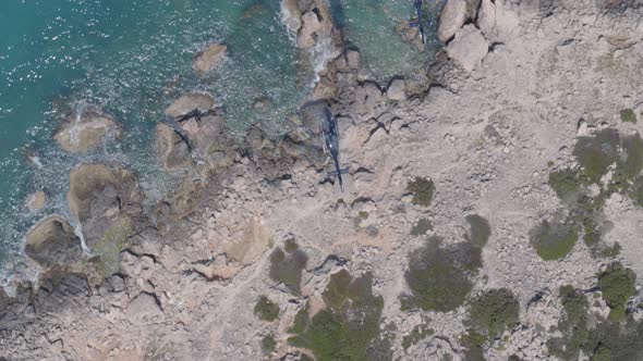 Top Down Aerial Following Shot of Helicopters Flying Over the Blue Ionian Sea
