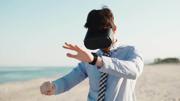 Businessman with Augmented Reality Viewer in Metaverse Beach