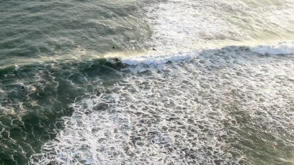 Aerial View Of Surfers Surfing At La Pampilla Beach In Miraflores, Lima, Peru.