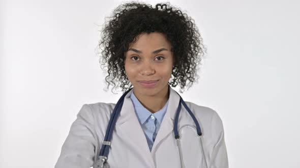 Portrait of Young Female Doctor Saying No with Finger Sign