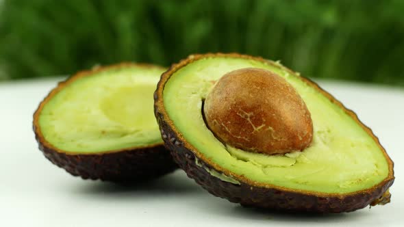 Rotation Avocado slow-motion close-up 4K video. A product of healthy and wholesome food