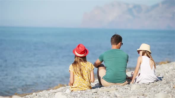 Happy Beautiful Family on a Tropical Beach Vacation