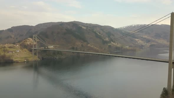 Drone Shot of a Suspension Bridge Spanning Over a Fjord in Bergen, Norway