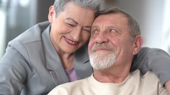 Tenderness and Love in the Relationship of an Elderly Grayhaired Couple