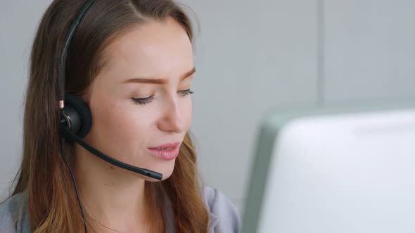 Business People Wearing Headset Working in Office