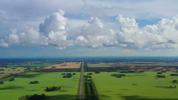 Magnificent landscapes of the fields from the drone. Picturesque clouds. Endless horizon.