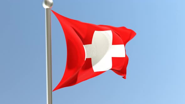 Swiss flag on flagpole.