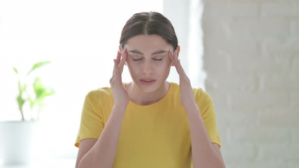 Portrait of Woman having Headache