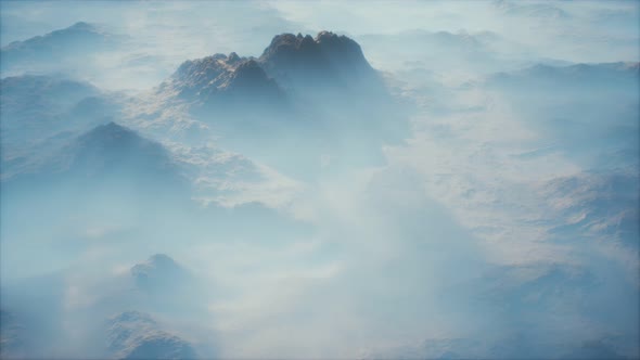 Distant Mountain Range and Thin Layer of Fog on the Valleys