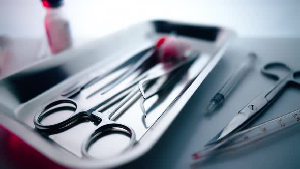 Medical Instruments in Steel Tray on Table for Surgery