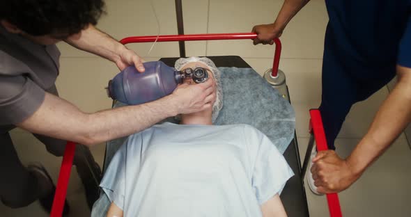 Medical Personnel Transport an Urgent Patient to the Emergency Room