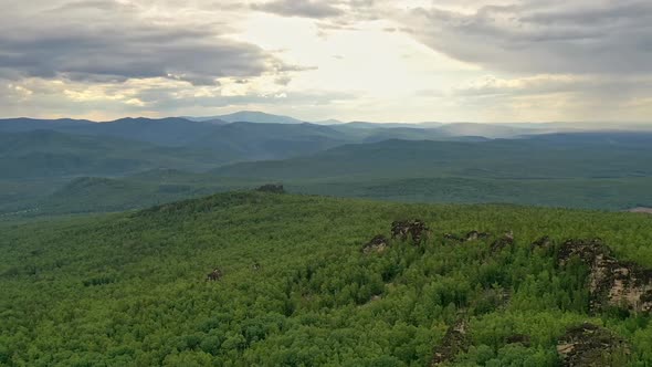 Aerial Hyperlapse of Sunset in the Mountains of Kuturchinsky Belogorie Russia Siberia