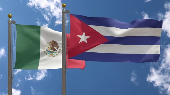 Mexico Flag Vs Cuba Flag On Flagpole