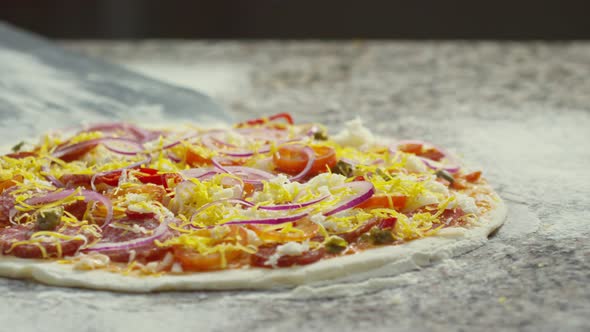 Chef Taking Pizza with Peel