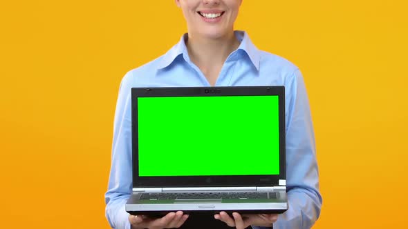 Business Woman Showing Laptop With Green Screen, Application Advertisement