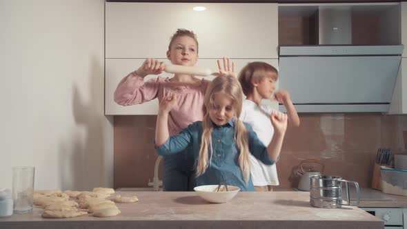 Blond Children Dancing, Two Girls and a Boy Having Fun and Dancing