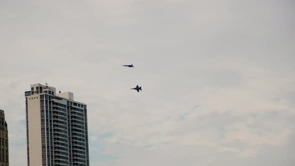 Two Jet Fighter Fly By Air Plane Military Force Army Over City