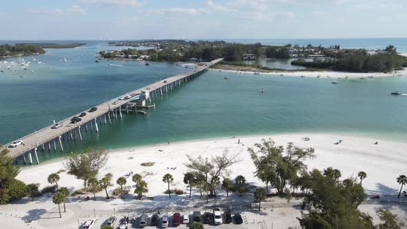 gorgeous orbiting aerial of the boating activity near Longboat Pass and Jewfish Key in Sarasota, Flo