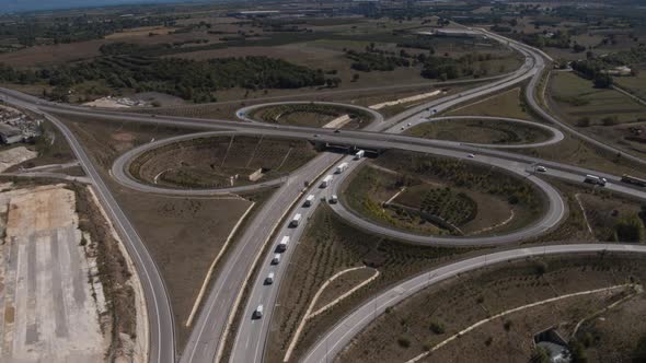 Highway Intersection Roundabout Trucks Passing Aerial View 