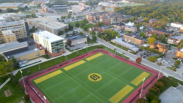 Soccer Fields on University of Missouri Campus - Aerial Drone Orbiting City View