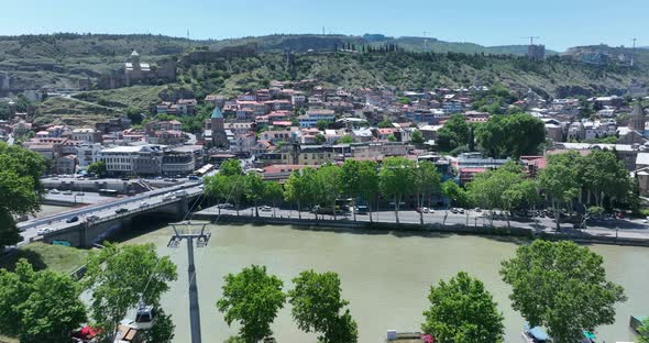 Tbilisi, Georgia - May 23 2022: Aerial view of Old Tbilisi, Flying over historic houses