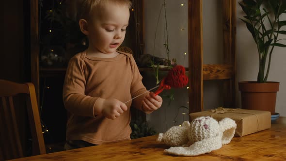 Toddler Boy Celebrating Valentine's Day at Home