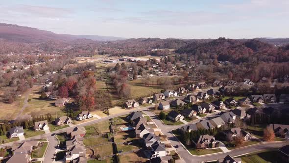 Aerial establishing slow motion view of Chattanooga TN, Red Bank, fall in USA.