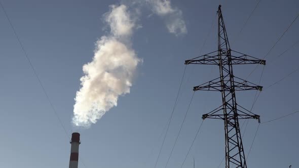 Factory Smoke Against the Blue Sky