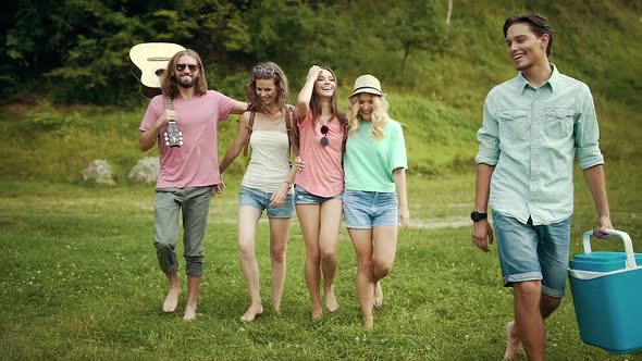 Happy Friends Having Fun Outdoors In Nature.