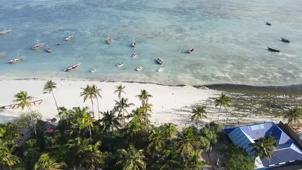 Coastal Landscape of Zanzibar Tanzania  Boats Near the Shore