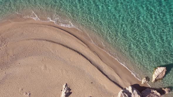 Aerial Drone View of Coastline with Clear Turquoise Water